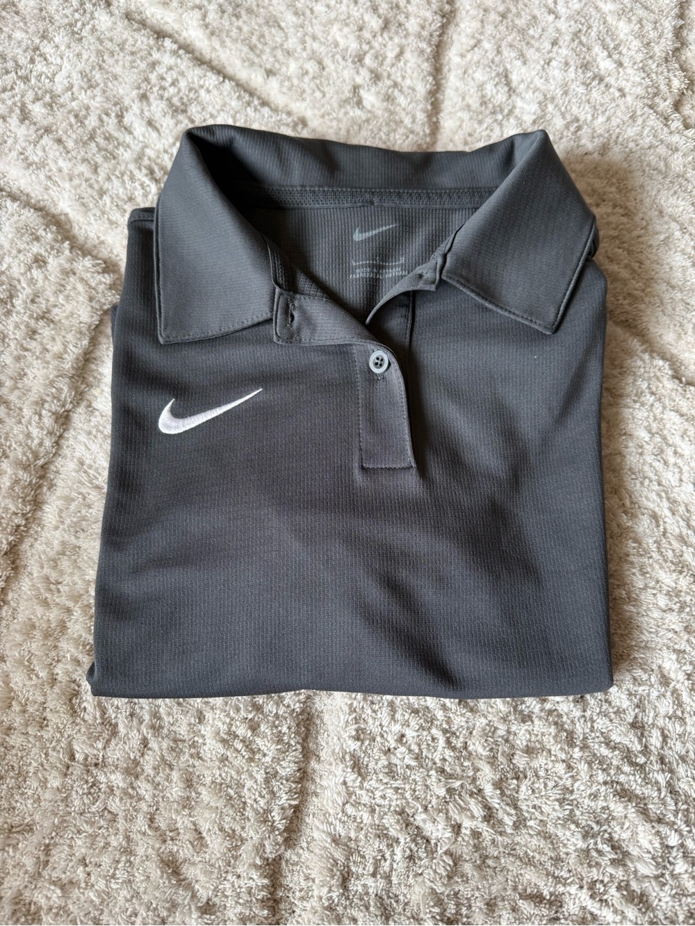 Nike Black Polo Shirt with White Swoosh